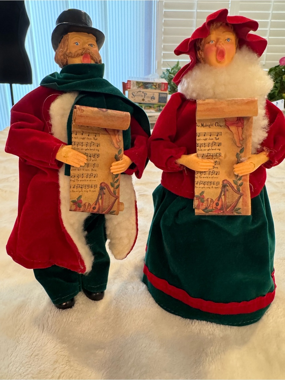 Vintage paper mache Victorian-style Christmas carolers